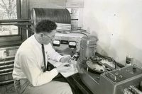 Dr. Frank Parker measuring radioactivity in evaporated water samples in the Department of Sanitary Engineering at the Harvard School of Public Health.