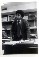 Poussaint Afro at his desk.tif
