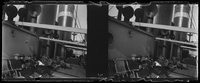 Troops lounging on the ship home from WWI