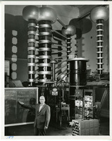 Lauriston Sale Taylor in a high voltage laboratory during the making of a movie on radiation protection