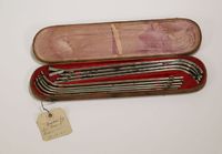 Metal catheters in case, 1860-1922